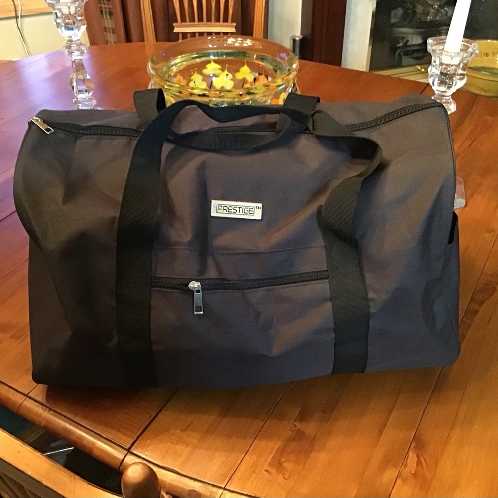 NWOT Prestige Travel Duffle Bag in Black.